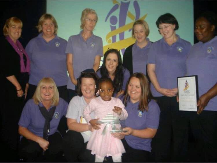Children's Hospital Pyjamas CEO's daughter, with a team of nurses, after winningCroydon's Child of Courage award 8 years ago!